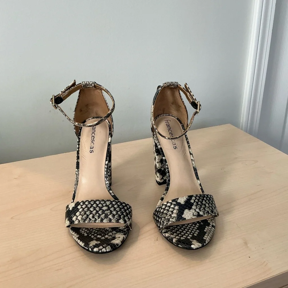 Francesca’s snake print embossed ankle strap heels
